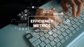 Hands Typing on Keyboard with Digital Graphics Representing Efficiency Metrics and Data Analysis in a Modern Workspace Royalty Free Stock Photo