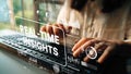 Hands Typing on Keyboard with Digital Interface Showing Real-Time Insights and Data Visualization Elements. Asymptotic Royalty Free Stock Photo
