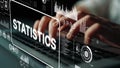Hands Typing on Keyboard with Digital Statistics Graphics Overlay for Business and Technology Concept. Asymptotic smart Royalty Free Stock Photo