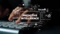 Hands Typing on Keyboard with Predictive Intelligence Graphics and Data Visualization Elements in Modern Workspace Royalty Free Stock Photo