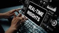 Hands Typing on Keyboard with Real-Time Insights Displayed on Modern Screen Interface and Data Analytics Graphics Royalty Free Stock Photo