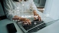 Hands typing on laptop with algorithm graphics overlay, highlighting digital technology and data analysis concepts Royalty Free Stock Photo