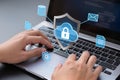 Hands typing laptop with cloud security shield interface. AI generated Royalty Free Stock Photo