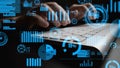 Hands Typing on Laptop with Digital Data Visualization and Graphs Representing Technology, Business Analysis, and Royalty Free Stock Photo