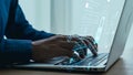 Hands typing on laptop with digital holographic interface showing data analytics, technology, and computer interactions Royalty Free Stock Photo