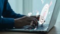 Hands Typing on Laptop with Digital Marketing Analytics, Data Visualization, and Business Metrics Overlaid on Screen in Royalty Free Stock Photo