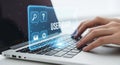 Hands typing on laptop with digital user interface overlay for modern technology concept Royalty Free Stock Photo