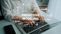 Hands Typing on Laptop Displaying Predictive Modeling Graphics and Data Analysis Concepts for Business Insight Royalty Free Stock Photo