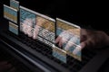 Hands Typing on Laptop with Floating Coding Windows in Dark Room, Representing Programming, Technology, and Digital Royalty Free Stock Photo