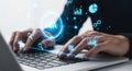 Hands typing on laptop with futuristic digital interface overlay data analytics technology Royalty Free Stock Photo
