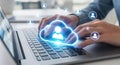 Hands typing on laptop with glowing cloud computing icon and user network connections Royalty Free Stock Photo