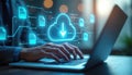 Hands typing on laptop, with glowing cloud data transfer icon above. Modern DMS, automation software to archive manage info Royalty Free Stock Photo