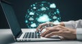 Hands typing on laptop with glowing cloud network data visualization Royalty Free Stock Photo