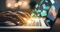 Hands typing on a laptop with glowing digital data cubes emerging from the screen Royalty Free Stock Photo