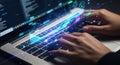 Hands typing on a laptop with glowing digital data streams Royalty Free Stock Photo