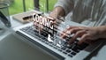 Hands Typing on Laptop Keyboard with Coding and Programming Concepts, Source Code, Data Structure, and Software Royalty Free Stock Photo