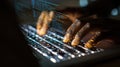 Hands Typing on Laptop Keyboard with Data Code Overlay at Night Royalty Free Stock Photo