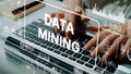 Hands Typing on Laptop Keyboard with Data Mining Concept and Digital Analytics Graphics Background. Asymptotic smart Royalty Free Stock Photo