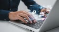Hands typing on laptop keyboard with digital interface overlay modern technology concept Royalty Free Stock Photo