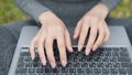 Hands Typing On Laptop Keyboard.Freelancer Internet Online Meeting Webinar.Woman Freelance With Computer Outdoors.Study Royalty Free Stock Photo