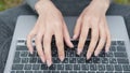 Hands Typing On Laptop Keyboard.Freelancer Internet Online Meeting Webinar.Woman Freelance With Computer Outdoors.Study Royalty Free Stock Photo