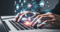 Hands typing on laptop keyboard with futuristic digital network overlay and data visualization Royalty Free Stock Photo