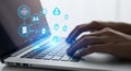 Hands typing on a laptop keyboard with glowing digital network connections symbolizing technology Royalty Free Stock Photo