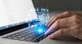 Hands typing on laptop keyboard with glowing saas text and digital data flowing Royalty Free Stock Photo