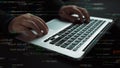Hands Typing on Laptop Keyboard Surrounded by Colorful Code Snippets and Programming Language Elements Illustrating Royalty Free Stock Photo