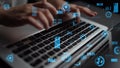 Hands Typing on Laptop Keyboard Surrounded by Futuristic Data Visualizations and Digital Analytics Elements Depicting Royalty Free Stock Photo