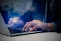 Hands typing on laptop with programming code on screen, representing software development. Perfect for coding, IT solutions, Royalty Free Stock Photo