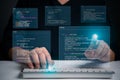 Hands typing on laptop with programming code on screen, representing software development. Perfect for coding, IT solutions, Royalty Free Stock Photo