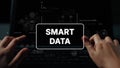Hands Typing on Laptop with Smart Data Concept and Digital Graphics in Background. Asymptotic smart data analytic Royalty Free Stock Photo