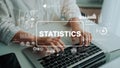 Hands Typing on Laptop with Statistics Graphics and Data Charts in Modern Office Environment. Asymptotic smart data Royalty Free Stock Photo