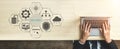 Hands Typing on Laptop Surrounded by Hexagonal Icons Representing Technology Concepts and No Code Development Quark Royalty Free Stock Photo