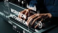 Hands Typing on Laptop with Workflow Automation Graphics and Digital Elements Representing Modern Technology Concepts Royalty Free Stock Photo