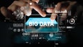 Hands Typing on Touchscreen with Big Data Visualization Overlay in Modern Digital Environment. Asymptotic smart data Royalty Free Stock Photo