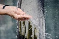 Hands under water fountain Royalty Free Stock Photo