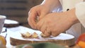 Hands Unwrap A Garlic Slow Motion