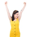 Hands up. Woman celebrating with stretched arms, isolated on white background. Carefree girl