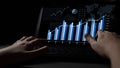 Hands of a user interacting with data visualization on a laptop screen, displaying analytics charts, graphs, and Royalty Free Stock Photo