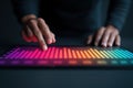 Hands Using Digital Tablet for Data Visualization with Colorful Chart Display in Dark Setting Royalty Free Stock Photo