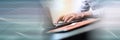 Hands using a laptop, light effect  panoramic banner Royalty Free Stock Photo