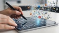 Hands using smart pen on digital tablet, real-time notes transforming into 3D graphics, education innovation Royalty Free Stock Photo
