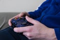 Hands using video game controller Royalty Free Stock Photo