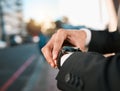 Hands, watch and time with business man in street, road with calendar date, schedule and notification. Entrepreneur, iot