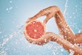 Hands, water splash and grapefruit cosmetic skincare for vitamin c nutrition, citrus health treatment and natural Royalty Free Stock Photo