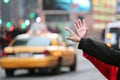 Hands waving for a cab taxi in new york Royalty Free Stock Photo