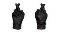 Hands wearing black leather gloves make the fingers crossed gesture, view from front and back