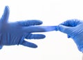 Hands wearing blue medical latex gloves Protection against flu, virus and coronavirus. Health care and surgical concept. Correct Royalty Free Stock Photo